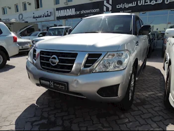 Nissan  Patrol  2016  Manual  185٬000 Km  8 Cylinder  Four Wheel Drive (4WD)  SUV  Silver