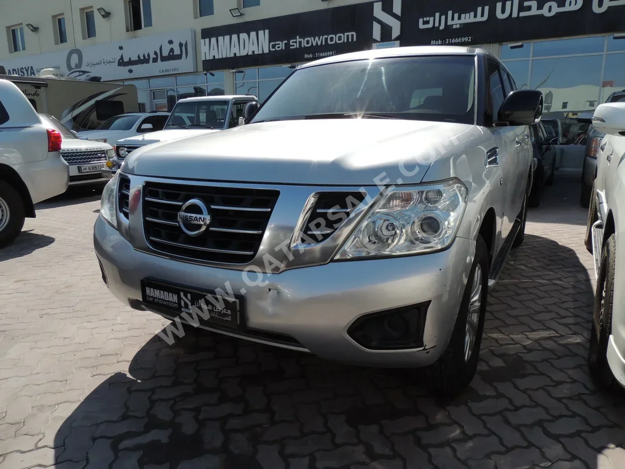 Nissan  Patrol  2016  Manual  185٬000 Km  8 Cylinder  Four Wheel Drive (4WD)  SUV  Silver