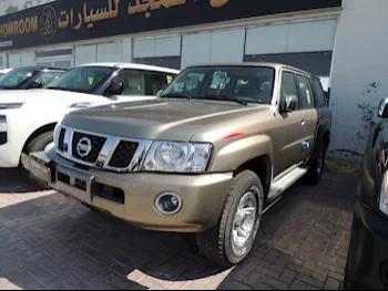 Nissan  Patrol  Safari  2023  Automatic  0 Km  6 Cylinder  Four Wheel Drive (4WD)  SUV  Gold  With Warranty