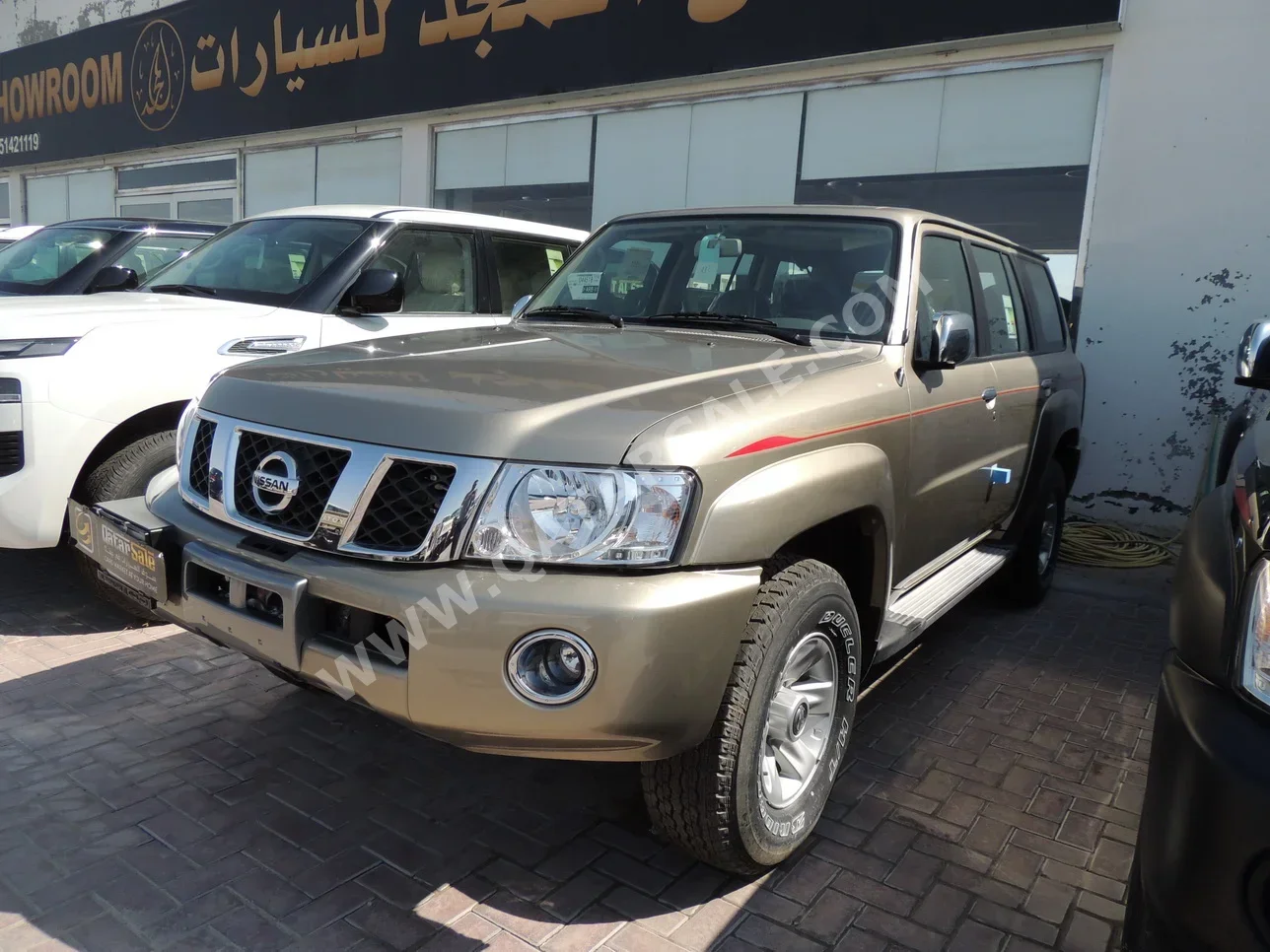 Nissan  Patrol  Safari  2023  Automatic  0 Km  6 Cylinder  Four Wheel Drive (4WD)  SUV  Gold  With Warranty