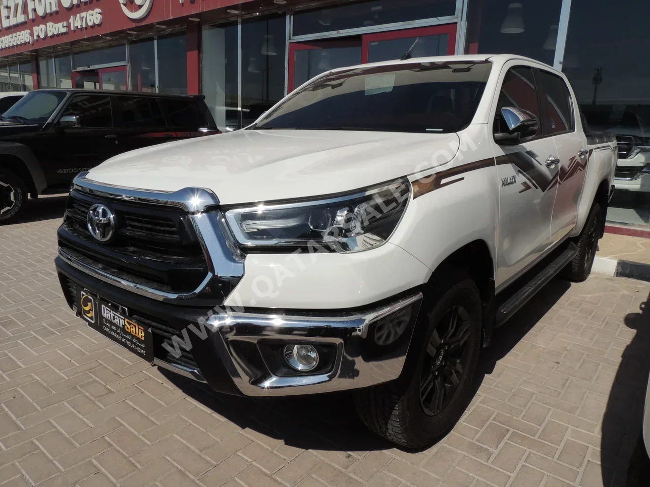 Toyota  Hilux  SR5  2024  Automatic  19,000 Km  4 Cylinder  Four Wheel Drive (4WD)  Pick Up  White  With Warranty