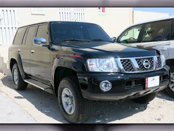 Nissan  Patrol  Safari  2022  Automatic  6,000 Km  6 Cylinder  Four Wheel Drive (4WD)  SUV  Black  With Warranty