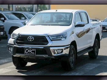 Toyota  Hilux  2024  Automatic  0 Km  4 Cylinder  Four Wheel Drive (4WD)  Pick Up  White  With Warranty