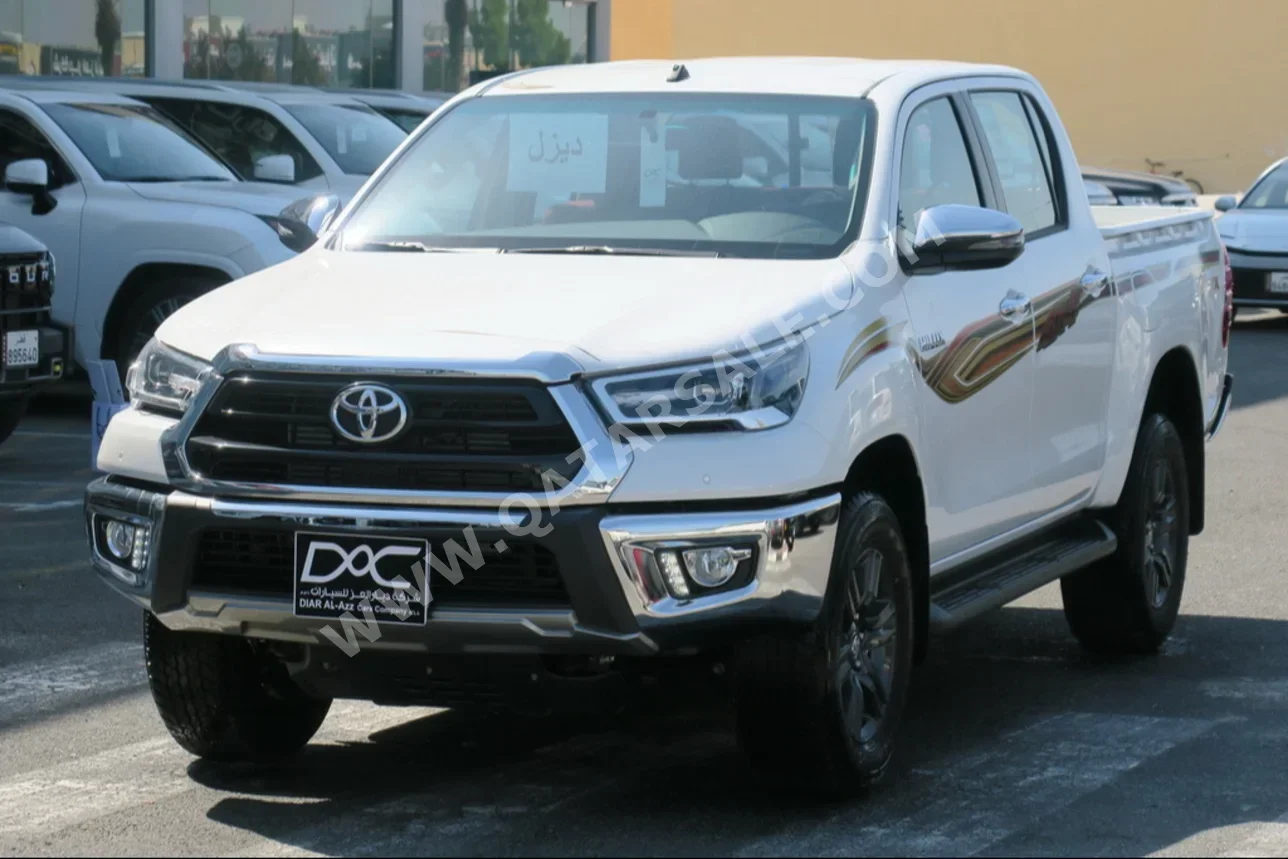 Toyota  Hilux  2024  Automatic  0 Km  4 Cylinder  Four Wheel Drive (4WD)  Pick Up  White  With Warranty