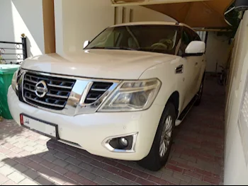 Nissan  Patrol  SE  2015  Automatic  83,000 Km  8 Cylinder  Four Wheel Drive (4WD)  SUV  White