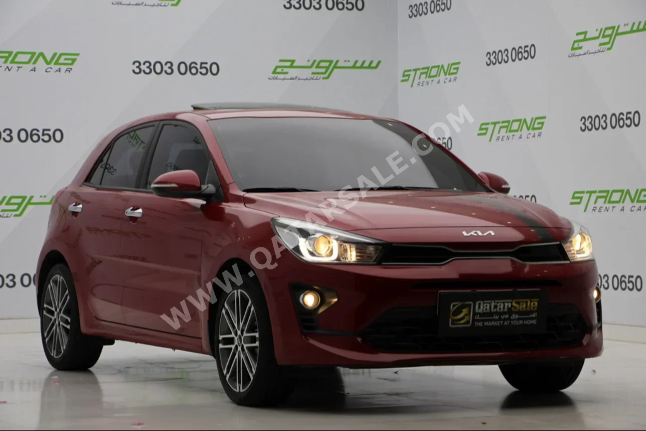 Kia  Rio  2022  Automatic  50,000 Km  4 Cylinder  Front Wheel Drive (FWD)  Sedan  Maroon  With Warranty