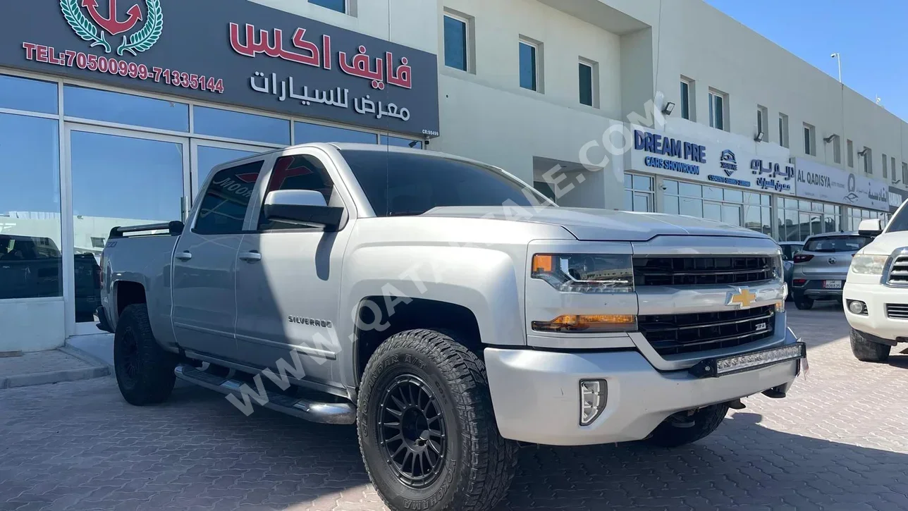 Chevrolet  Silverado  LT  2018  Automatic  185,000 Km  8 Cylinder  Four Wheel Drive (4WD)  Pick Up  White