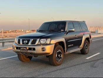 Nissan  Patrol  Super Safari  2021  Manual  26,000 Km  6 Cylinder  Four Wheel Drive (4WD)  SUV  Gray  With Warranty