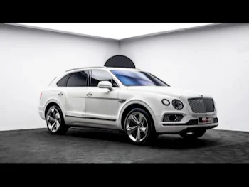 Bentley  Bentayga  2017  Automatic  20,120 Km  12 Cylinder  Four Wheel Drive (4WD)  SUV  White