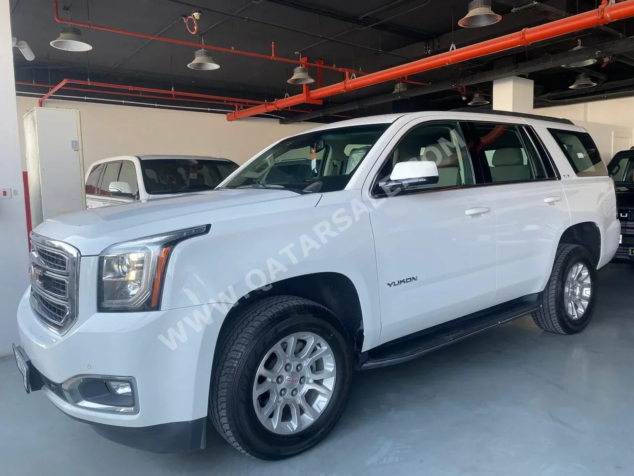 GMC  Yukon  SLE  2018  Automatic  55,000 Km  8 Cylinder  Rear Wheel Drive (RWD)  SUV  White