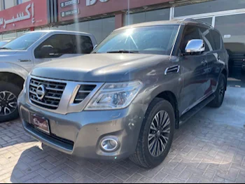 Nissan  Patrol  Platinum  2014  Automatic  244,000 Km  8 Cylinder  Four Wheel Drive (4WD)  SUV  Gray