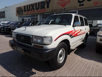 Toyota  Land Cruiser  GX  1997  Manual  167,000 Km  6 Cylinder  Four Wheel Drive (4WD)  SUV  White