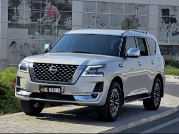 Nissan  Patrol  Platinum  2023  Automatic  12,000 Km  6 Cylinder  Four Wheel Drive (4WD)  SUV  Silver  With Warranty