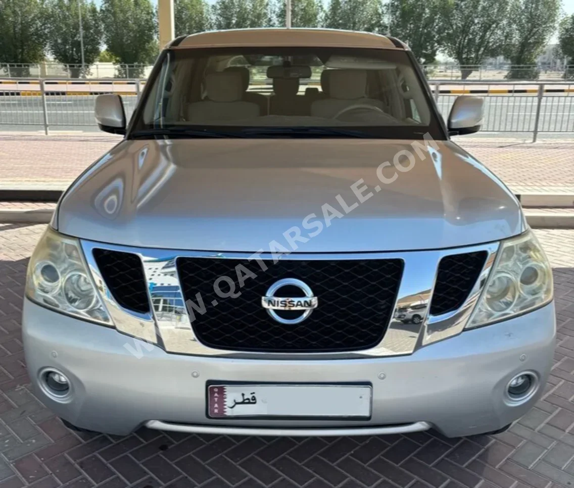 Nissan  Patrol  SE  2013  Automatic  223,000 Km  8 Cylinder  Four Wheel Drive (4WD)  SUV  Silver