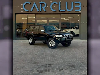 Nissan  Patrol  Safari  2021  Manual  70٬000 Km  6 Cylinder  Four Wheel Drive (4WD)  SUV  Black