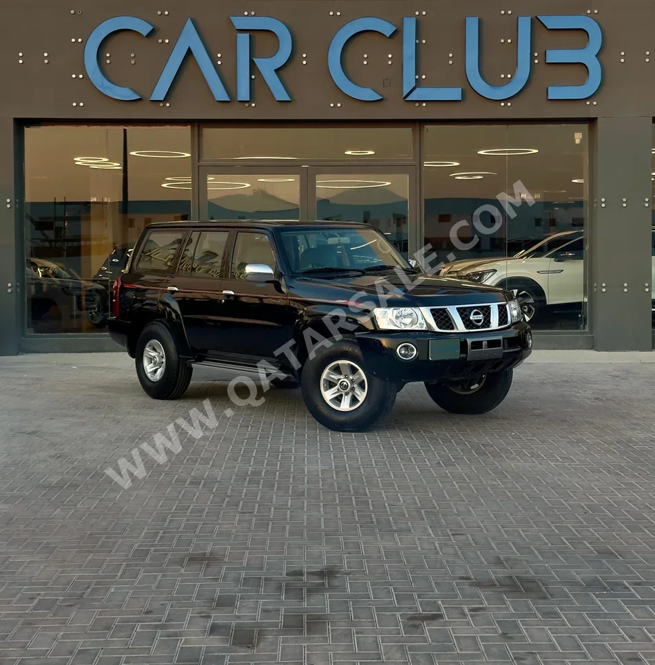 Nissan  Patrol  Safari  2021  Manual  70٬000 Km  6 Cylinder  Four Wheel Drive (4WD)  SUV  Black