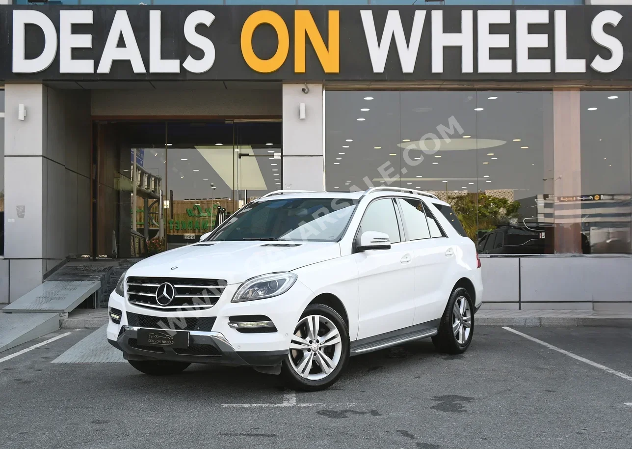 Mercedes-Benz  ML  350  2014  Automatic  65,000 Km  6 Cylinder  Four Wheel Drive (4WD)  SUV  White