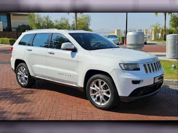 Jeep  Grand Cherokee  Summit  2014  Automatic  140,000 Km  8 Cylinder  Four Wheel Drive (4WD)  SUV  White