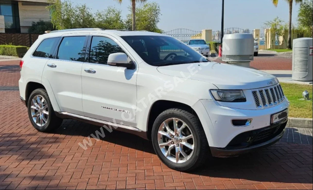 Jeep  Grand Cherokee  Summit  2014  Automatic  140,000 Km  8 Cylinder  Four Wheel Drive (4WD)  SUV  White