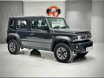 Suzuki  Jimny  2024  Automatic  1,500 Km  4 Cylinder  Four Wheel Drive (4WD)  SUV  Gray  With Warranty