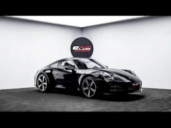 Porsche  911  Carrera  2025  Automatic  0 Km  6 Cylinder  Rear Wheel Drive (RWD)  Coupe / Sport  Black  With Warranty