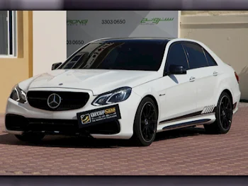 مرسيدس - بنز  اي - كلاس  63 AMG  2010  اوتوماتيك  150,000 كم  8 سلندر  دفع خلفي  سيدان  أبيض