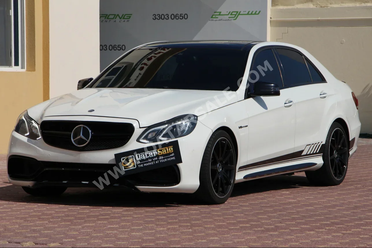 Mercedes-Benz  E-Class  63 AMG  2010  Automatic  150,000 Km  8 Cylinder  Rear Wheel Drive (RWD)  Sedan  White