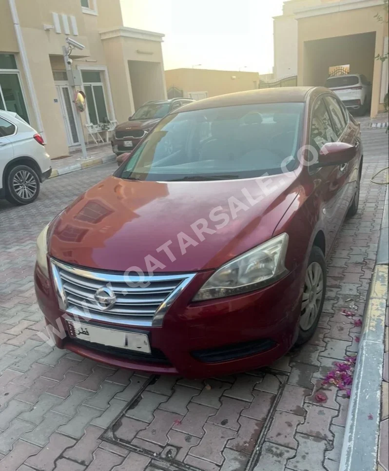 Nissan  Sentra  2014  Automatic  233,868 Km  4 Cylinder  Front Wheel Drive (FWD)  Sedan  Red