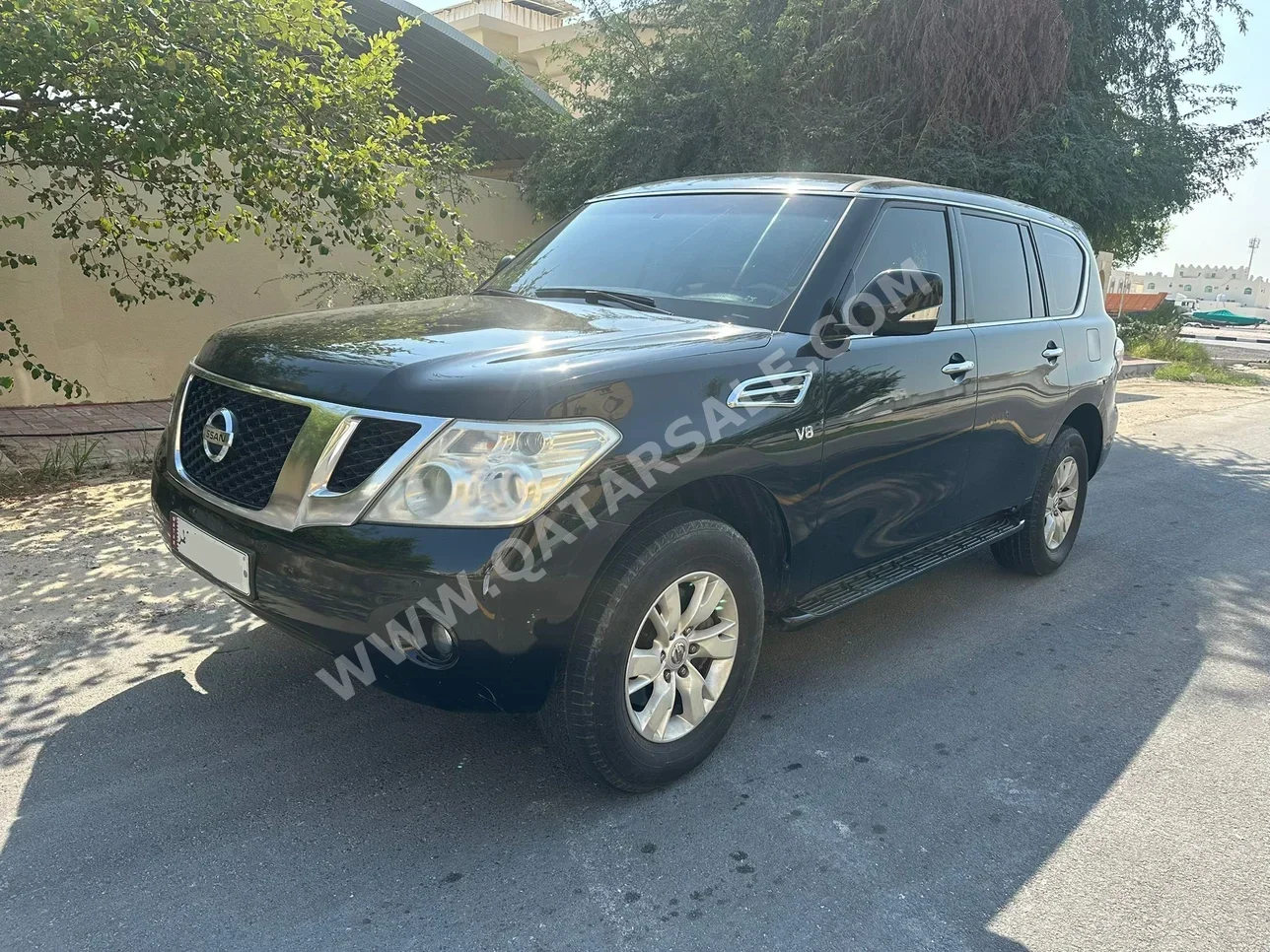 Nissan  Patrol  SE  2013  Automatic  30,000 Km  8 Cylinder  Four Wheel Drive (4WD)  SUV  Black