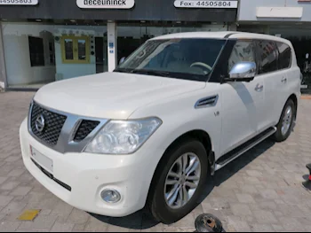 Nissan  Patrol  LE  2013  Automatic  219,000 Km  8 Cylinder  Four Wheel Drive (4WD)  SUV  White