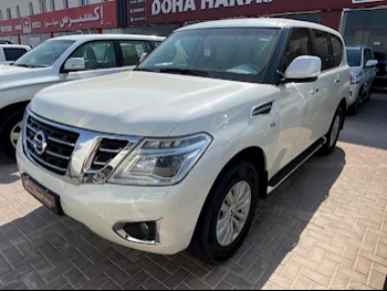 Nissan  Patrol  SE  2015  Automatic  281,000 Km  8 Cylinder  Four Wheel Drive (4WD)  SUV  White