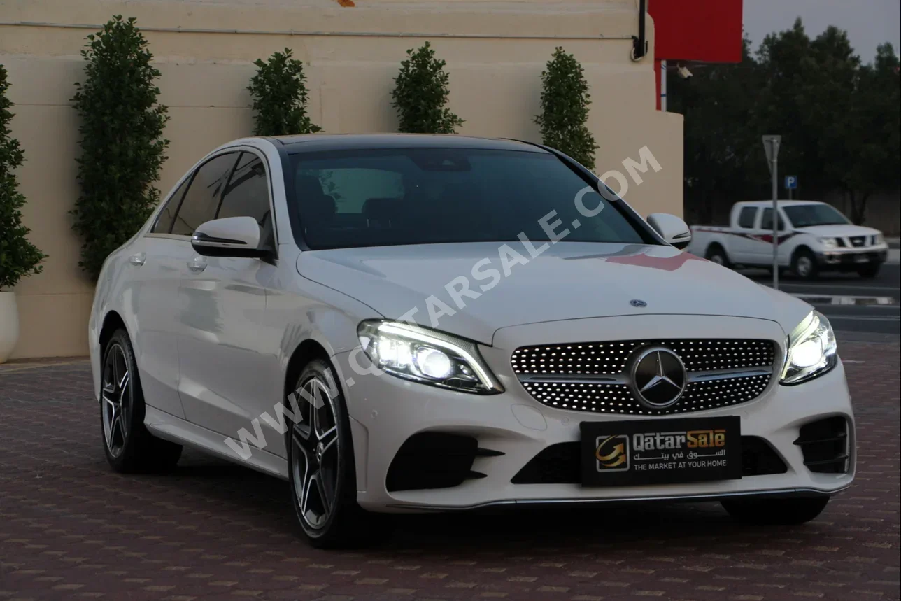 Mercedes-Benz  C-Class  200  2020  Automatic  65,000 Km  4 Cylinder  Rear Wheel Drive (RWD)  Sedan  White