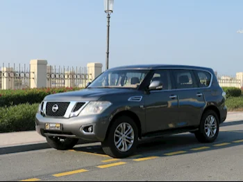 Nissan  Patrol  SE  2014  Automatic  82,000 Km  8 Cylinder  Four Wheel Drive (4WD)  SUV  Gray