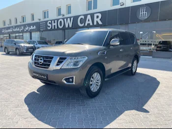 Nissan  Patrol  SE  2015  Automatic  228,000 Km  8 Cylinder  Four Wheel Drive (4WD)  SUV  Bronze