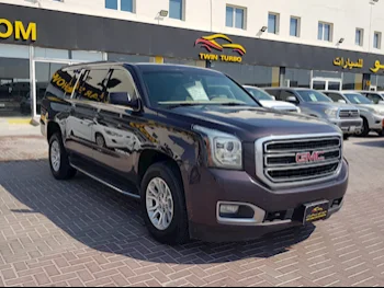 GMC  Yukon  XL  2015  Automatic  229,000 Km  8 Cylinder  Four Wheel Drive (4WD)  SUV  Brown