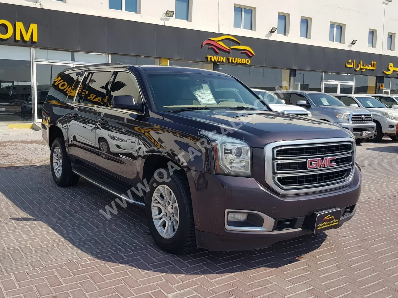 GMC  Yukon  XL  2015  Automatic  229,000 Km  8 Cylinder  Four Wheel Drive (4WD)  SUV  Brown