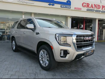  GMC  Yukon  SLT  2023  Automatic  54,000 Km  8 Cylinder  Four Wheel Drive (4WD)  SUV  Gold  With Warranty