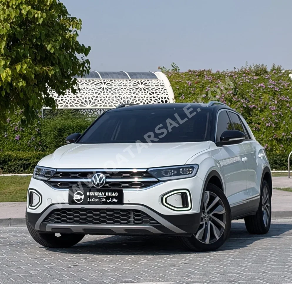 Volkswagen  T-Roc  Style  2023  Automatic  6,872 Km  4 Cylinder  Rear Wheel Drive (RWD)  SUV  White  With Warranty