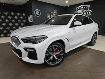 BMW  X-Series  X6 40i  2021  Automatic  49,100 Km  6 Cylinder  All Wheel Drive (AWD)  SUV  White  With Warranty