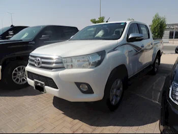 Toyota  Hilux  SR5  2017  Manual  133,000 Km  4 Cylinder  Four Wheel Drive (4WD)  Pick Up  White