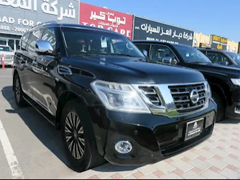 Nissan  Patrol  Platinum  2015  Automatic  220,000 Km  8 Cylinder  Four Wheel Drive (4WD)  SUV  Black