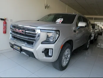 GMC  Yukon  SLT  2021  Automatic  23,000 Km  8 Cylinder  Four Wheel Drive (4WD)  SUV  Gold  With Warranty