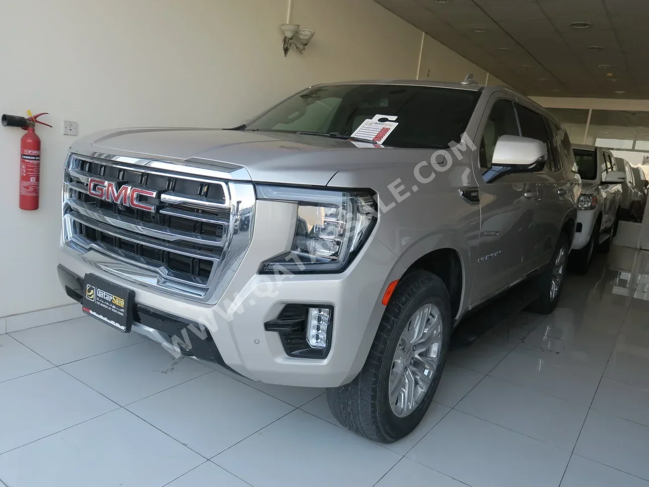 GMC  Yukon  SLT  2021  Automatic  23,000 Km  8 Cylinder  Four Wheel Drive (4WD)  SUV  Gold  With Warranty