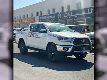 Toyota  Hilux  2025  Automatic  0 Km  4 Cylinder  Four Wheel Drive (4WD)  Pick Up  White  With Warranty