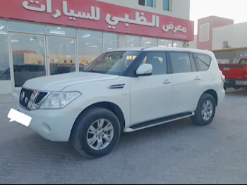 Nissan  Patrol  SE  2013  Manual  157,000 Km  8 Cylinder  Four Wheel Drive (4WD)  SUV  White