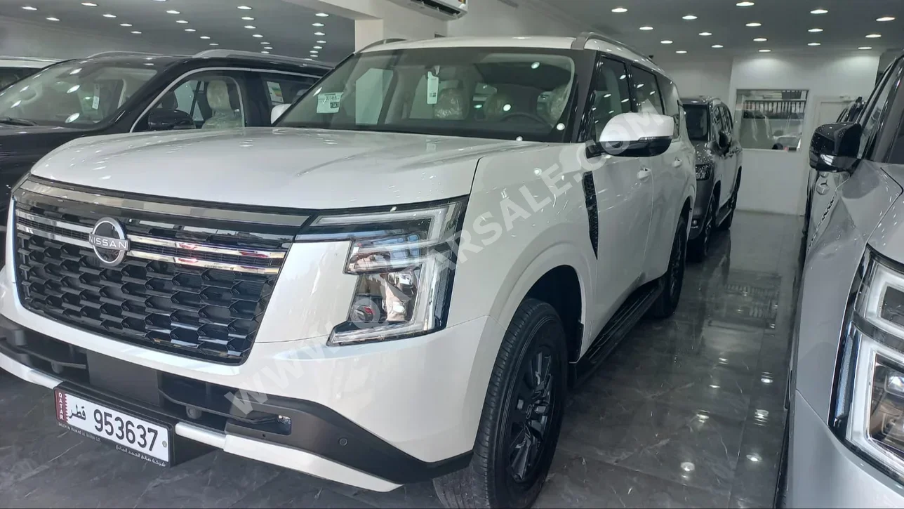 Nissan  Patrol  SE  2025  Automatic  0 Km  6 Cylinder  Four Wheel Drive (4WD)  SUV  White  With Warranty