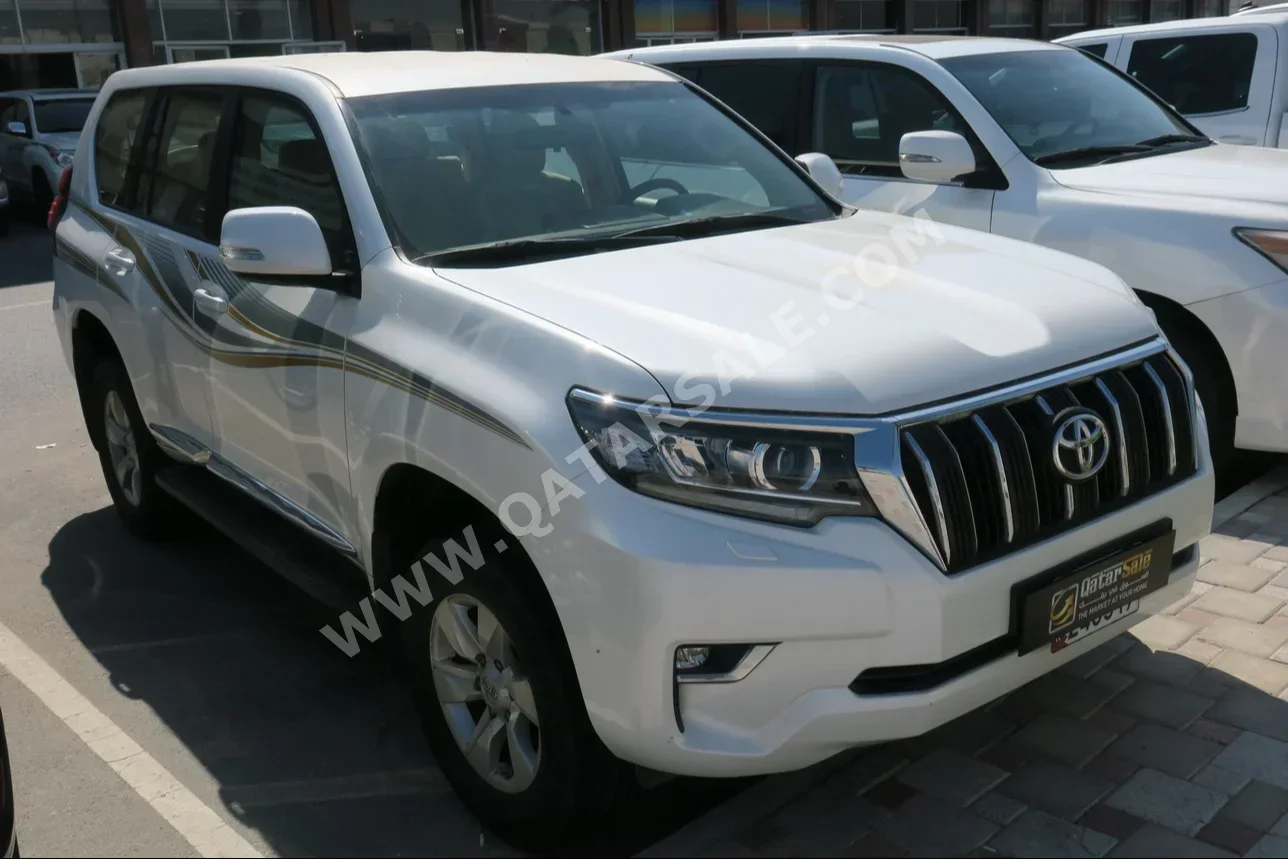  Toyota  Prado  TXL  2019  Automatic  77,000 Km  6 Cylinder  Four Wheel Drive (4WD)  SUV  White  With Warranty