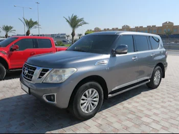 Nissan  Patrol  SE  2014  Automatic  184,000 Km  8 Cylinder  Four Wheel Drive (4WD)  SUV  Gray