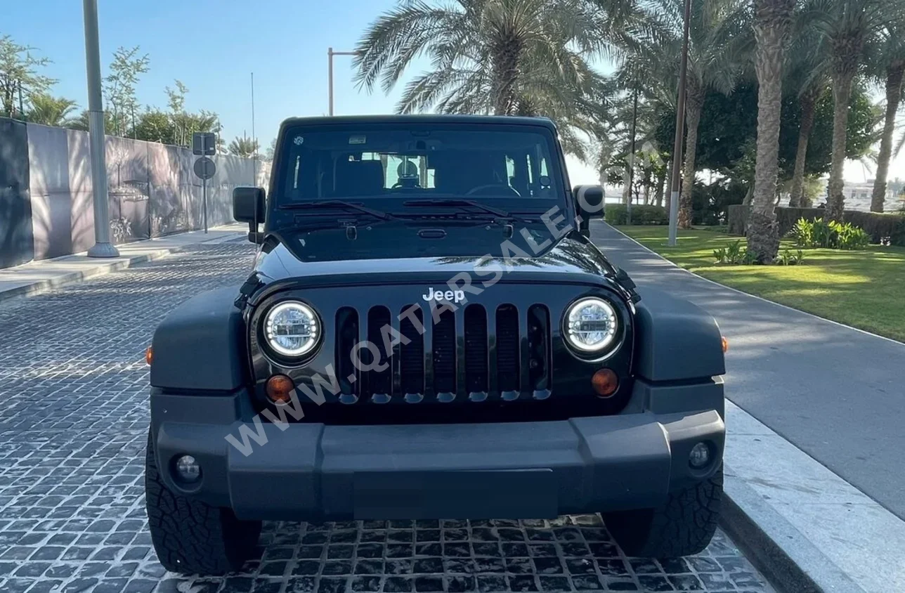 Jeep  Wrangler  Sport  2013  Automatic  218,000 Km  6 Cylinder  Four Wheel Drive (4WD)  SUV  Black