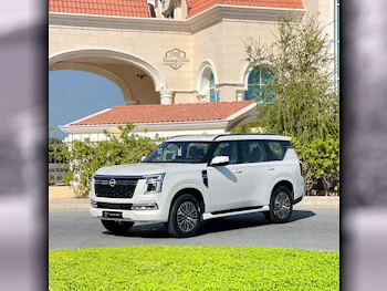 Nissan  Patrol  Platinum  2025  Automatic  0 Km  8 Cylinder  Four Wheel Drive (4WD)  SUV  White  With Warranty